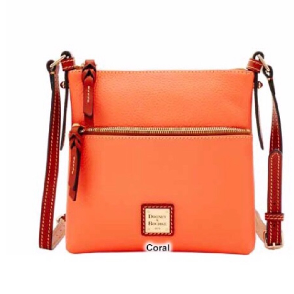 Just reduced! Dooney and Burke crossbody bag Coral with discounted shipping!